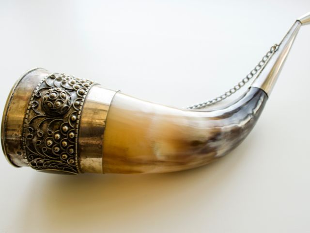 Beautifully crafted drinking horn with forged metal.