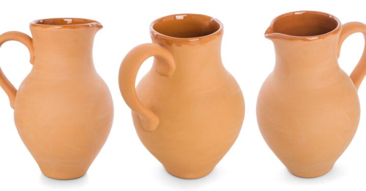 Three brown clay flagon in a white background.